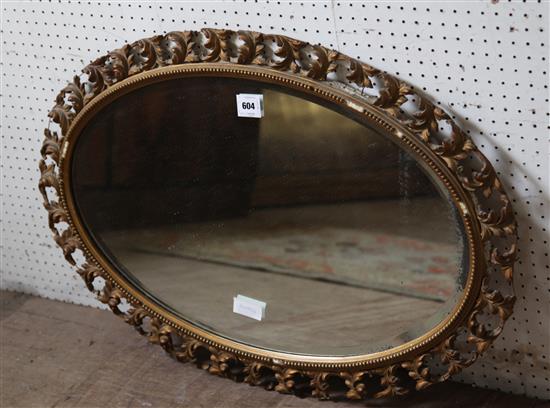 Oval gilt wall mirror